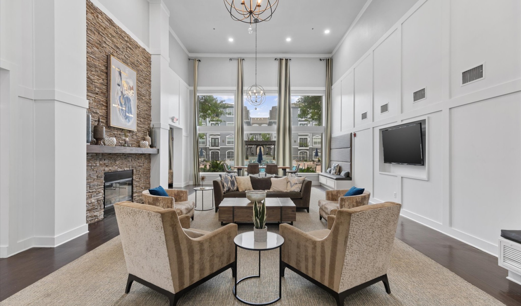 leasing office with lounge seating and large windows