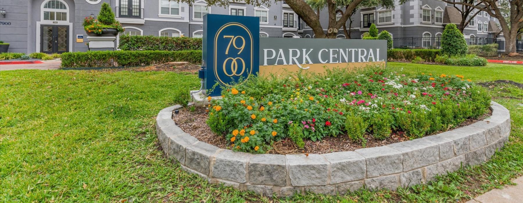 a sign in front of a building