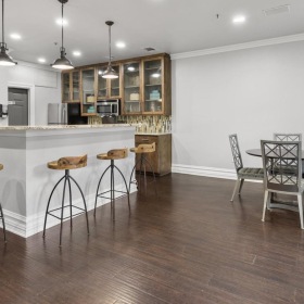Find your perfect fit at 7900 at Park Central a kitchen with a table and chairs