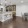 a kitchen with a table and chairs