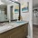 a bathroom with a large mirror