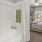 a bathroom with a bed and a bathtub
