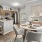 a kitchen with a dining table and chairs